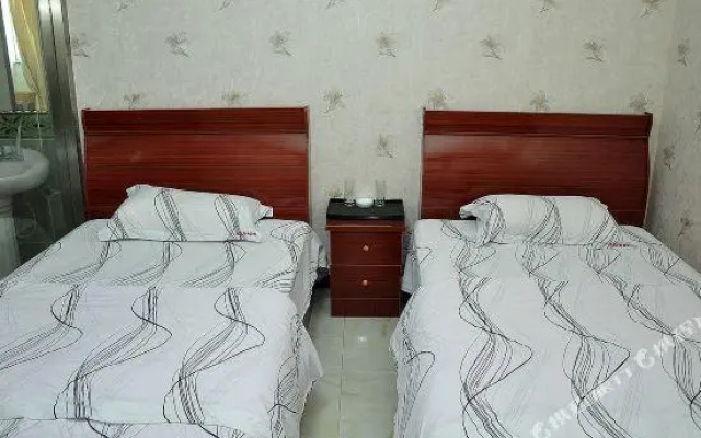 Yinan Shangjia Express Business Hotel