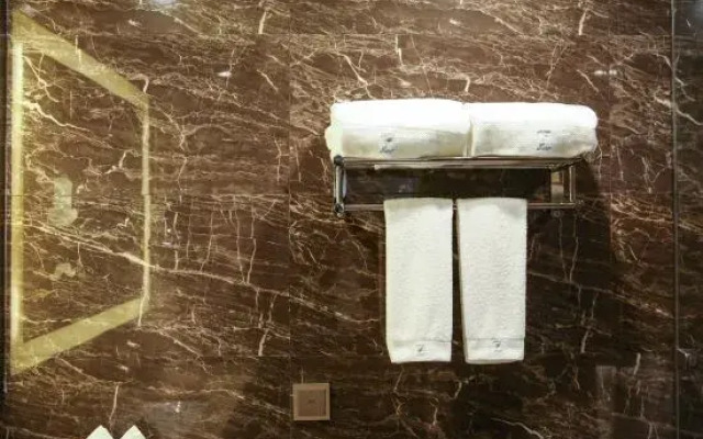 Huanuo Xinjinglun International Hotel