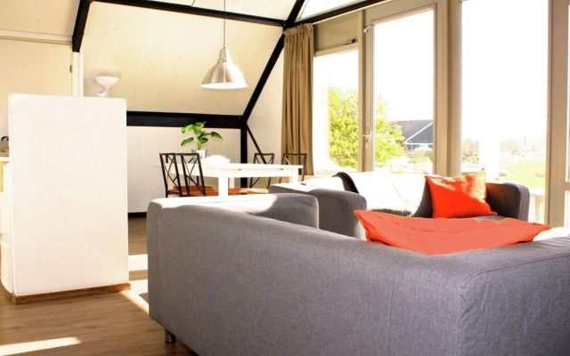 Cozy furnished house with a terrace, on a little beach