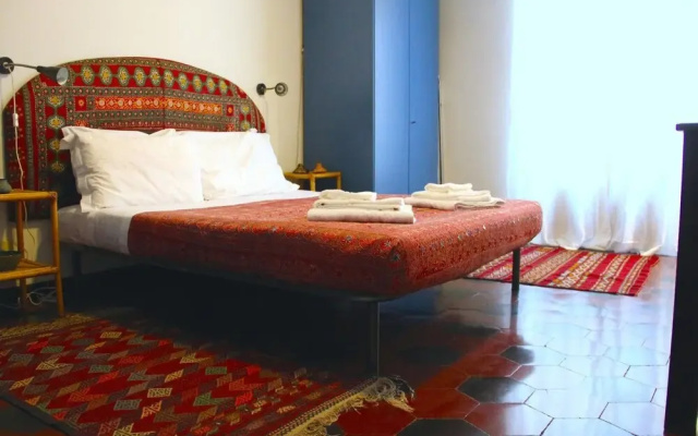 Ethnic Apt in Testaccio's Heart, Serviced by Hostmaker