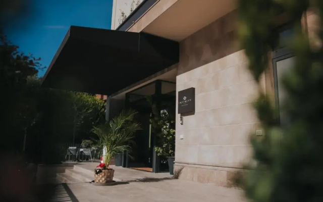 Infinity Hotel & More