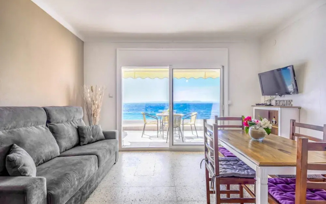 Beachfront Apartment in Platja Almadrava