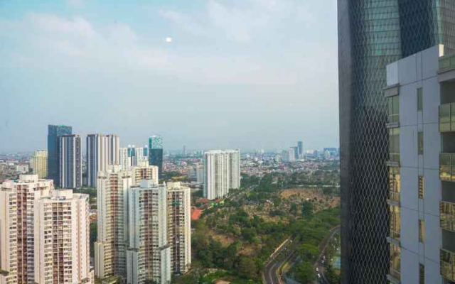 2BR Cozy @ The Empyreal Condominium Epicentrum Apartment By Travelio