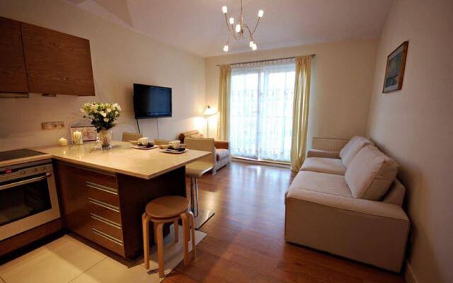 Апартаменты Sunrise Apartments комната для гостей