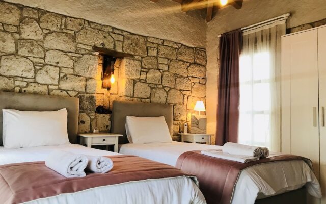 Отель Alacati Cona Butik Otel Чешме комната для гостей