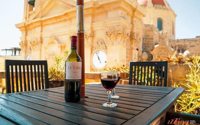 A Pretty Duplex Apartment in a Gozo Village Square