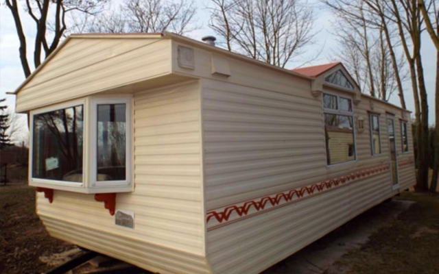 Mobile Home im Ferienpark mit Seezugang