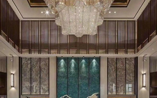 Xinzheng Xingangwanhua Hotel