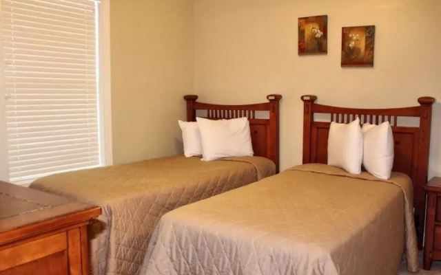 Magnolia Pointe 204 4879 2 Br condo by RedAwning