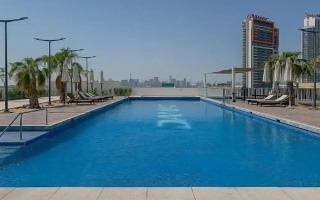 Nasma Holiday Homes - DAMAC Hills Artesia Tower C