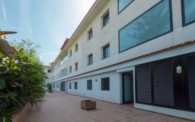 Отель Apartamentos Checkin Beatrix вид на фасад