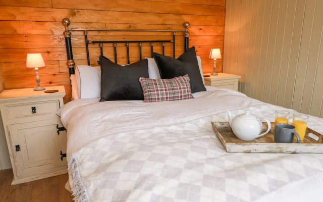 Woodmancote Lodge