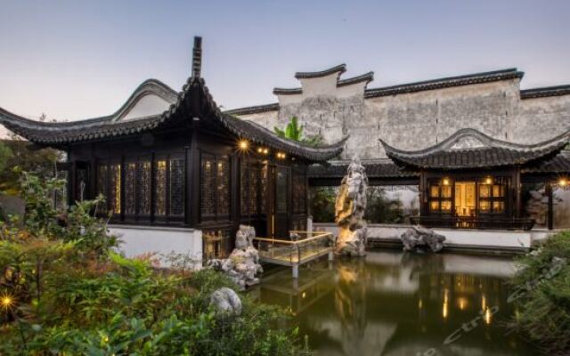 Отель Zhenze Waterside Houses вид на фасад