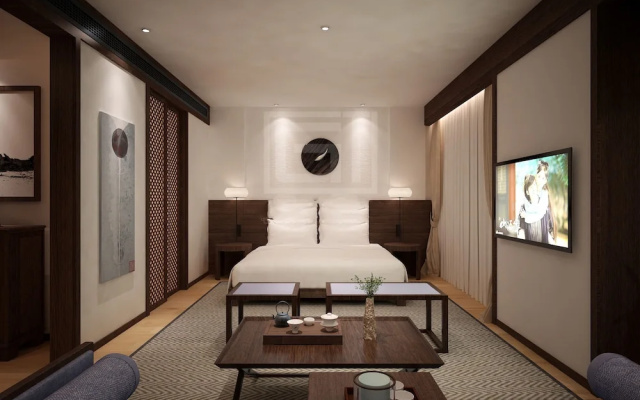 Qianna Jiuhe Boutique Hotel Zhoukou Shop