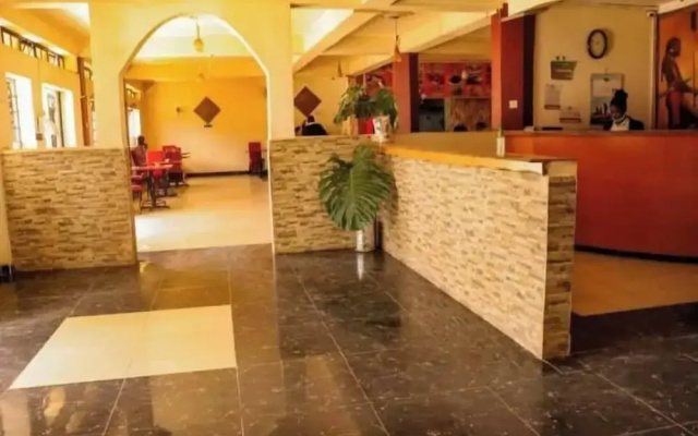 Kim's Breeze Hotel Ltd and Choma Zone