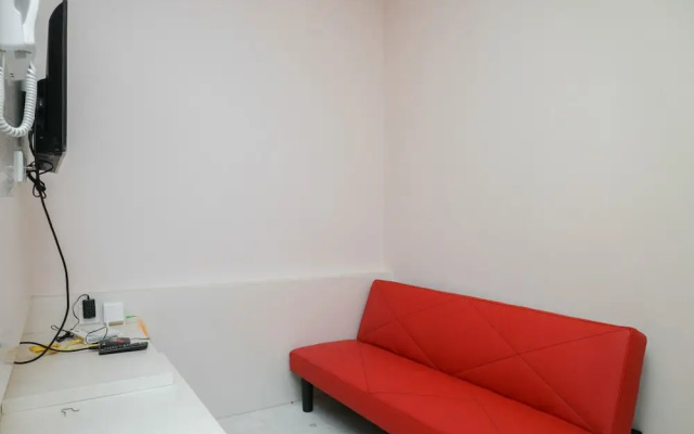 Modern 1BR Apartment at Puri Orchard
