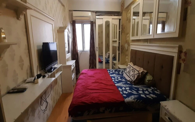OYO 93439 The Suites Metro Apartment By Interindo