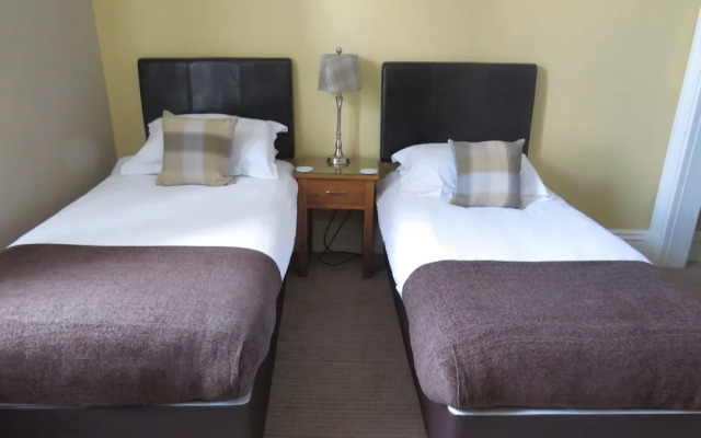 The Station Bar Grill and Rooms