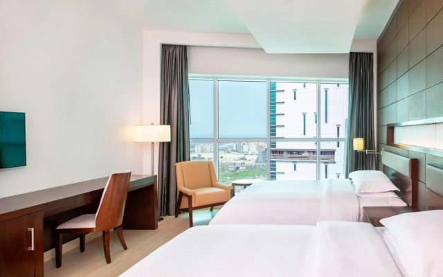 Отель Four Points by Sheraton Sharjah