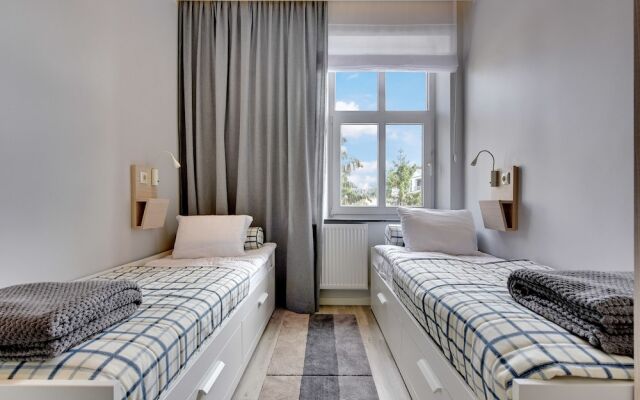 Апартаменты Lion Apartments - Nemo Сопот комната для гостей