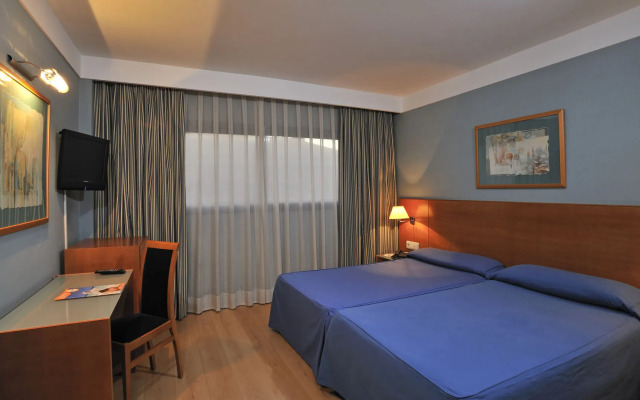 Отель Sercotel de los Reyes