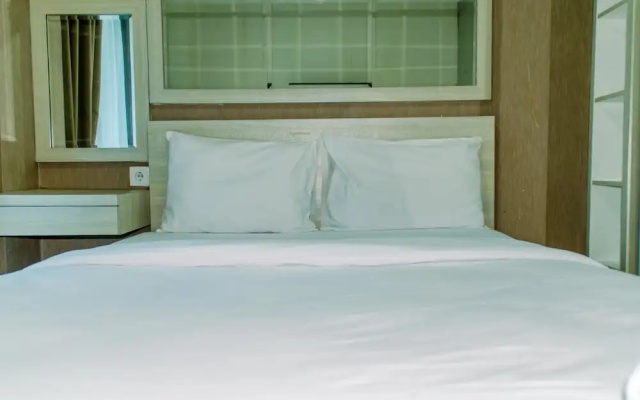 Homey And Warm Studio Room At Tifolia Apartment