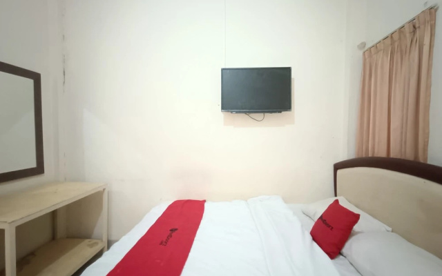RedDoorz Syariah Near Rumah Sakit Umum Wisata Uit(RedDoorz Syariah near Rumah Sakit Umum Wisata UIT)