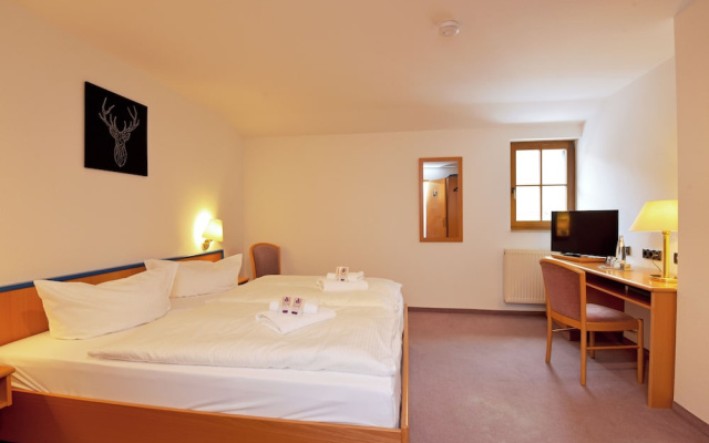 Landhotel Der Distelhof mit Scheunencafé