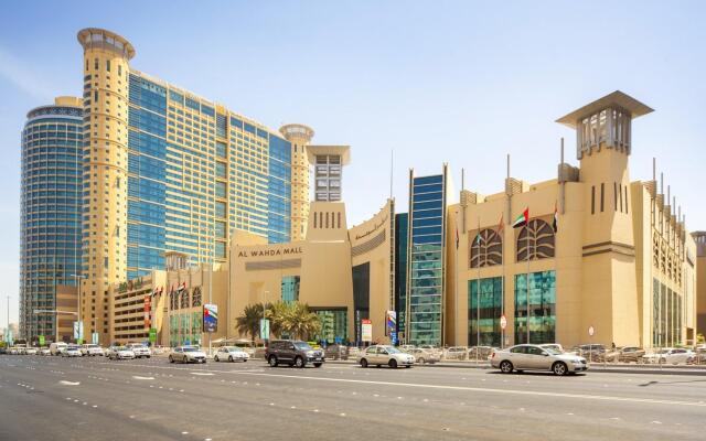 Отель Grand Millennium Al Wahda ОАЭ, Абу-Даби - 1 отзыв об отеле, цены и фото номеров - забронировать отель Grand Millennium Al Wahda онлайн вид на фасад