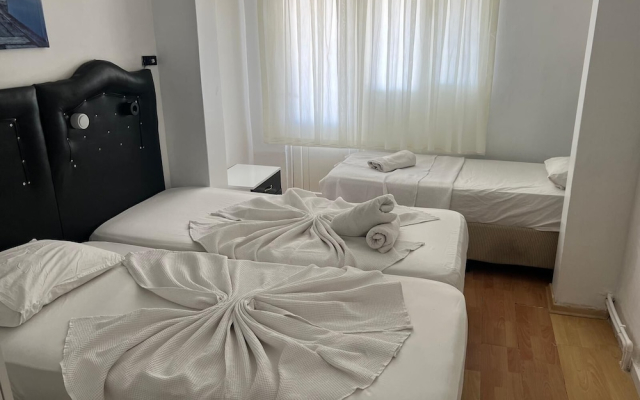 Merkez Pansiyon Sarımsaklı