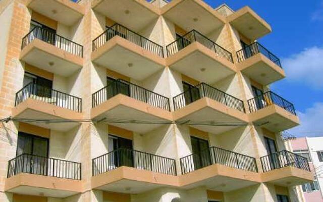 Апартаменты Shamrock Apartments Каура вид на фасад