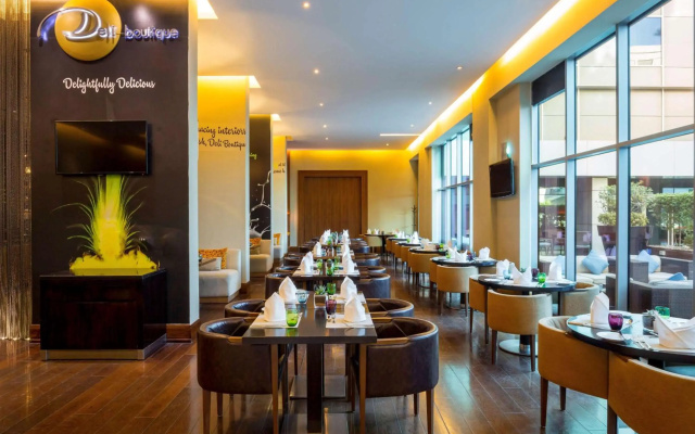 Отель Novotel Suites Mall Avenue Dubai