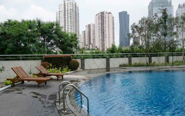 Amazing 1BR at The Wave Rasuna Epicentrum By Travelio