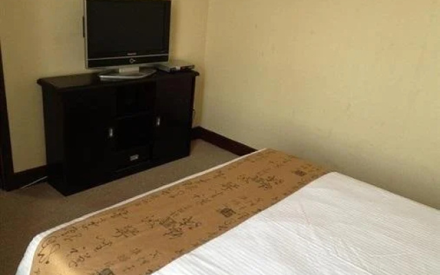 Baolong Homelike Hotel (Luojing Branch)