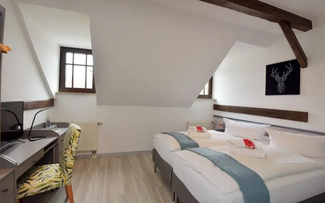 Landhotel Der Distelhof mit Scheunencafé
