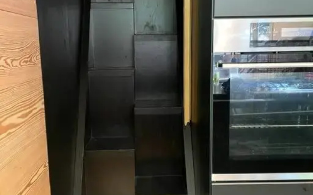 Houten bosvilla met sauna en 2 slaapkamers
