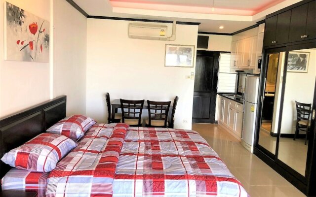 Апартаменты Top Floor Spacious Studio Паттайя комната для гостей