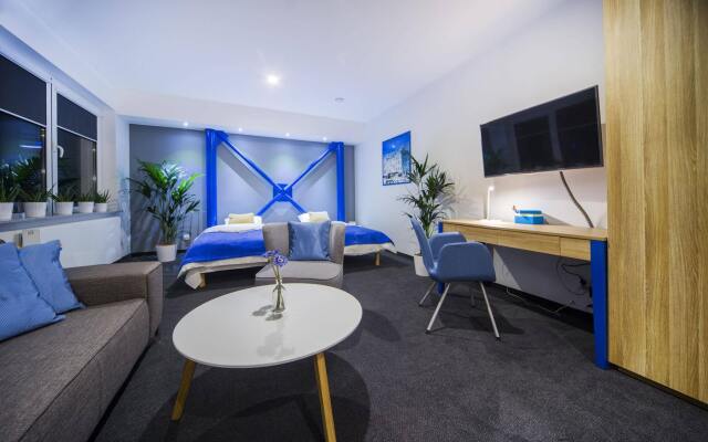Апартаменты Mosquito Silesia Apartments Катовице комната для гостей