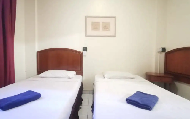OYO 90061 Kuhara Court Apartment Suite