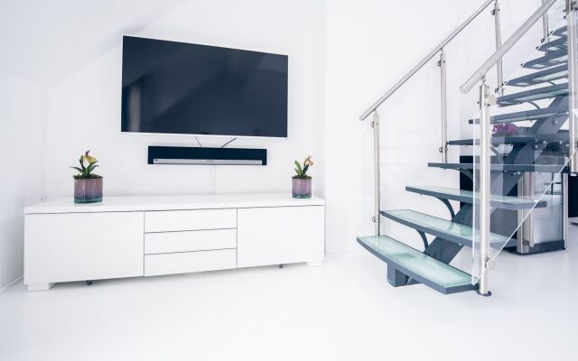 Отель Luxueux Triplex Брюссель комната для гостей