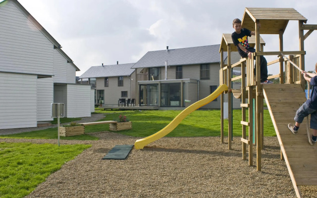 Child-friendly villa with stove, located in a lake area