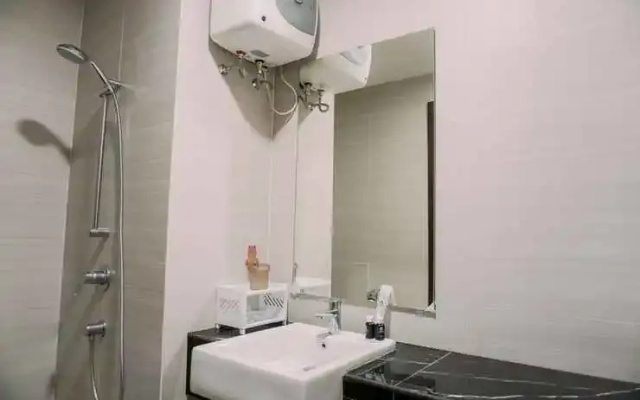 Warm and Homey Studio at West Vista Apartment By Travelio