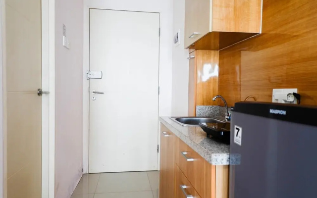 Strategic Studio Apartment at Orchard Mansion Supermall By Travelio