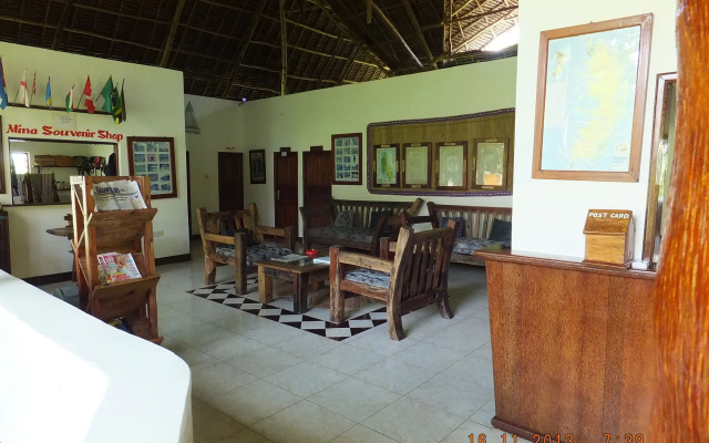 Отель Mnarani Beach Cottages
