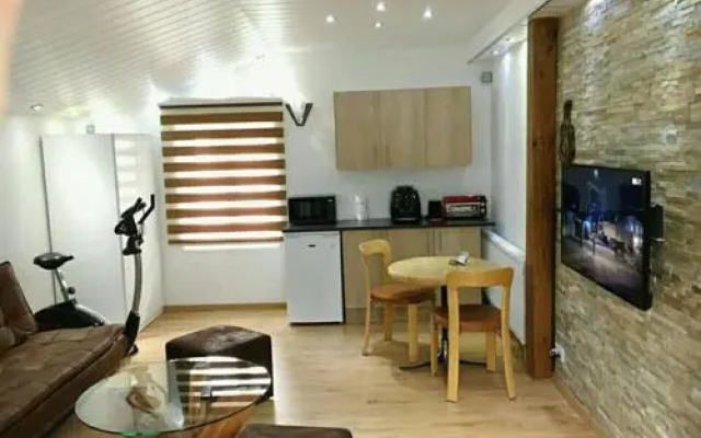 Studio cosy au centre de Couvet