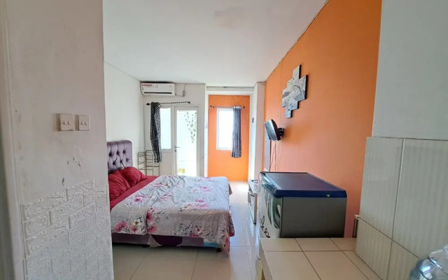 OYO Life 93139 Apartemen Grand Sentraland By Evi