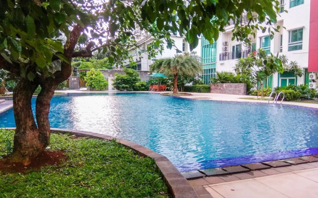 2BR Apartment with Sofa Bed at Woodland Park Residence By Travelio
