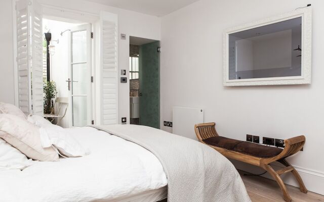 Отель Stylish 2 Bedroom Garden Apartment in Notting Hill Великобритания, Лондон - отзывы, цены и фото номеров - забронировать отель Stylish 2 Bedroom Garden Apartment in Notting Hill онлайн комната для гостей
