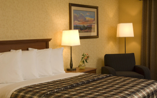 Merit Hotel & Suites