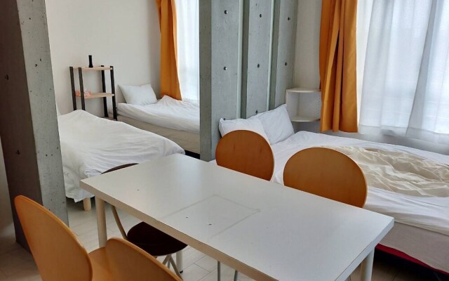 Отель Tsudoi Inn Fukuoka 1 комната для гостей
